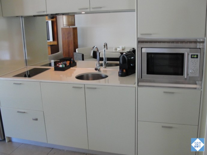 Most of the kitchen. The drawer at lower left (with the tag) is actually the dishwasher!