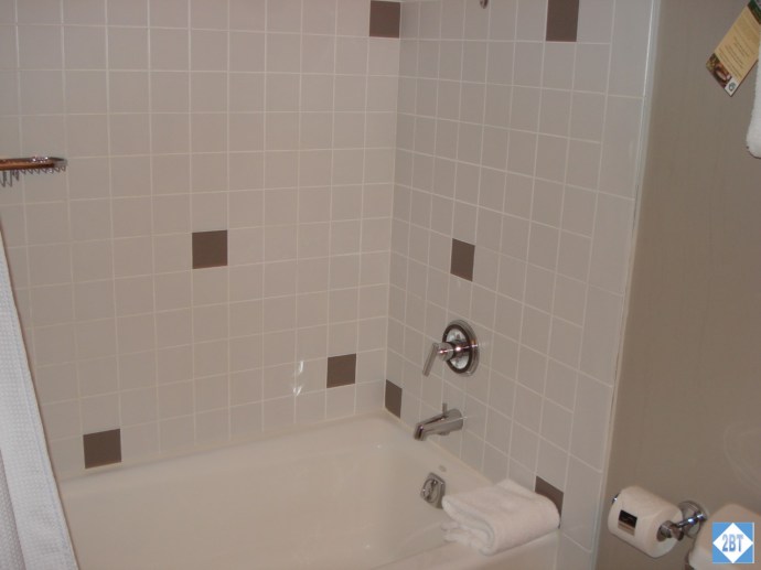 The hall bath has a combination shower/tub