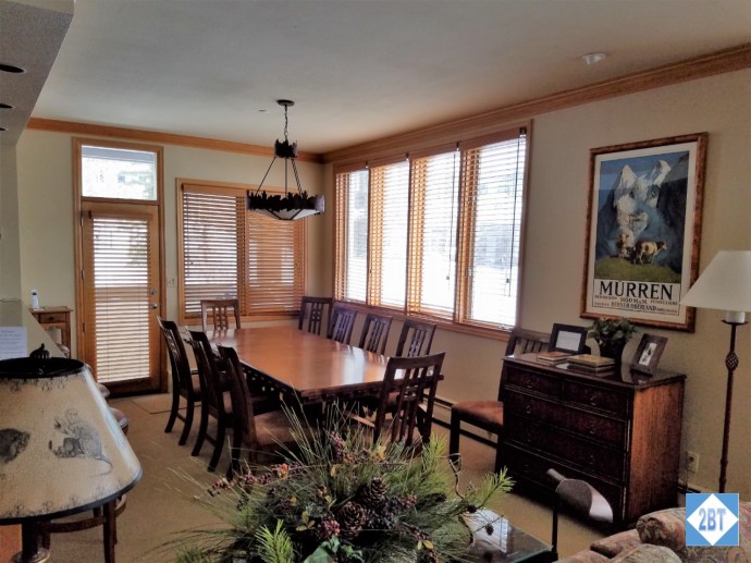 The dining table can seat ten people. While the large, heavy chairs look great, they're hard to maneuver.